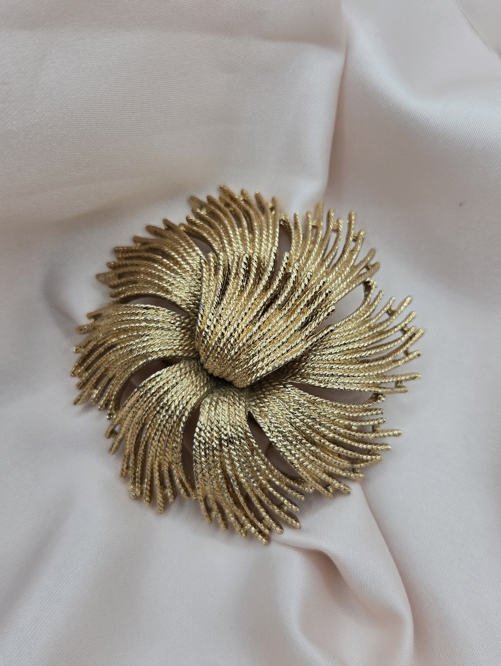 Vintage Monet Gold Tone Textured Swirl Flower Brooch Pin, Circa 1970s–1980s